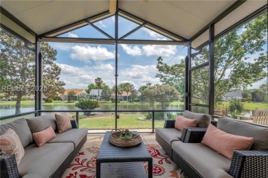 Enjoy Fabulous lagoon views from your large covered screen on Hidden Cypress Golf Club in South Carolina - for sale on GolfHomes.com, golf home, golf lot
