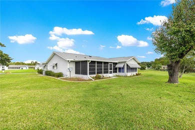 Welcome home to this immaculately maintained and sparkling clean on The Links of Spruce Creek in Florida - for sale on GolfHomes.com, golf home, golf lot