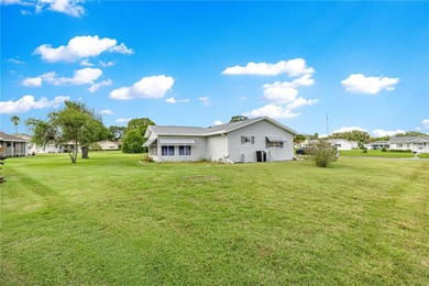Welcome home to this immaculately maintained and sparkling clean on The Links of Spruce Creek in Florida - for sale on GolfHomes.com, golf home, golf lot