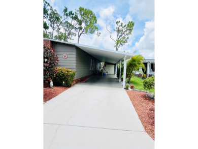 If you're looking for a large 2-bedroom, 2-bath home with a on Lake Fairways Country Club in Florida - for sale on GolfHomes.com, golf home, golf lot