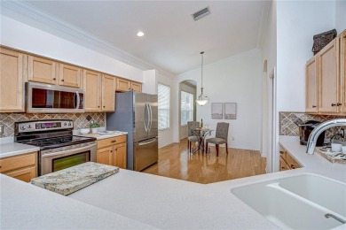 Welcome to a home that effortlessly blends timeless elegance on River Hills Country Club in Florida - for sale on GolfHomes.com, golf home, golf lot
