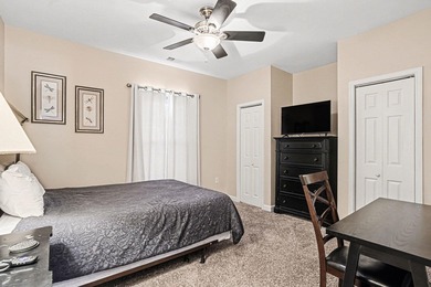 This first-floor end unit condominium features three bedrooms on Barefoot Resort and Golf Club  in South Carolina - for sale on GolfHomes.com, golf home, golf lot