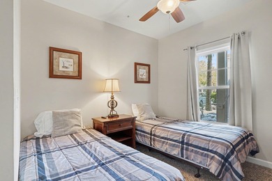 This first-floor end unit condominium features three bedrooms on Barefoot Resort and Golf Club  in South Carolina - for sale on GolfHomes.com, golf home, golf lot