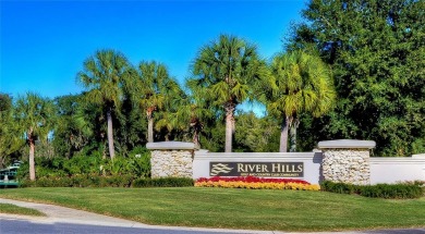 Welcome to a home that effortlessly blends timeless elegance on River Hills Country Club in Florida - for sale on GolfHomes.com, golf home, golf lot