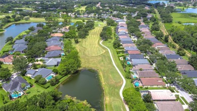 Welcome to a home that effortlessly blends timeless elegance on River Hills Country Club in Florida - for sale on GolfHomes.com, golf home, golf lot
