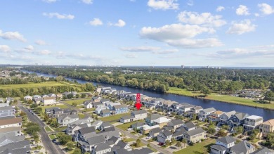 Welcome to this beautiful 4BR-3BA Low Country style home in on Myrtlewood Golf Course and Club  in South Carolina - for sale on GolfHomes.com, golf home, golf lot