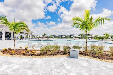 Experience luxury living at its finest in this fully furnished on Panther Run Golf Club in Florida - for sale on GolfHomes.com, golf home, golf lot