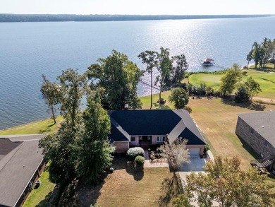 Welcome to a truly exceptional waterfront retreat on the coveted on Red Eagle Golf Course in Alabama - for sale on GolfHomes.com, golf home, golf lot