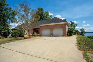 Welcome to a truly exceptional waterfront retreat on the coveted on Red Eagle Golf Course in Alabama - for sale on GolfHomes.com, golf home, golf lot