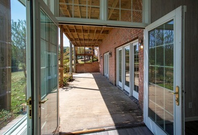 Welcome to a truly exceptional waterfront retreat on the coveted on Red Eagle Golf Course in Alabama - for sale on GolfHomes.com, golf home, golf lot