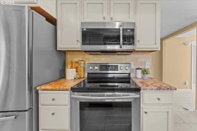 Welcome home to this charming 1-level townhome on the golf on Summerfield Golf and Country Club in Oregon - for sale on GolfHomes.com, golf home, golf lot