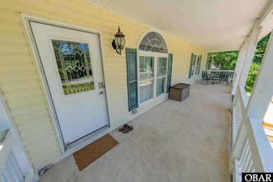 Welcome to your dream home, perfectly positioned in the heart of on Duck Woods Country Club in North Carolina - for sale on GolfHomes.com, golf home, golf lot