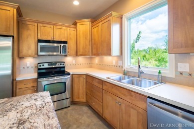 Welcome to 1291 Prestwick Drive, located in The Links at Rolling on The Links At Rolling Meadows in Michigan - for sale on GolfHomes.com, golf home, golf lot