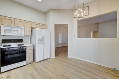 Newly remodeled with LVP flooring thoughout, 2-toned paint and on Highland Falls Golf Club in Nevada - for sale on GolfHomes.com, golf home, golf lot