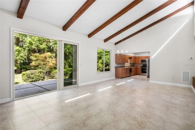 Under contract-accepting backup offers. Nestled in the on Turkey Creek Golf and Country Club in Florida - for sale on GolfHomes.com, golf home, golf lot
