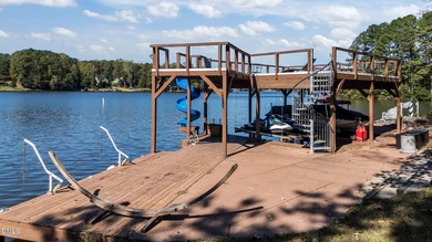 THE ULTIMATE LAKESIDE PLAYGROUND IS WAITING FOR YOU AT LAKE on River Golf and Country Club at Lake Royale in North Carolina - for sale on GolfHomes.com, golf home, golf lot
