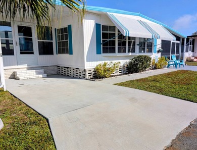 Turnkey Living! Expanded 2BR/2BA in Woodbrook Estates!  This on Grasslands Golf and Country Club in Florida - for sale on GolfHomes.com, golf home, golf lot