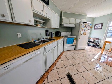 Turnkey Living! Expanded 2BR/2BA in Woodbrook Estates!  This on Grasslands Golf and Country Club in Florida - for sale on GolfHomes.com, golf home, golf lot