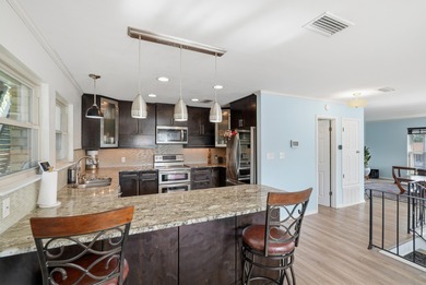 Welcome to effortless coastal living where every day feels like on Tiger Point Golf and Country Club in Florida - for sale on GolfHomes.com, golf home, golf lot