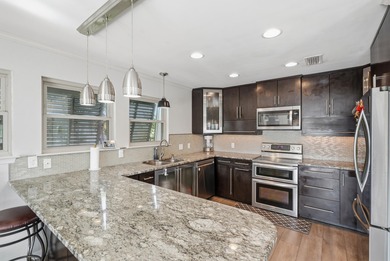 Welcome to effortless coastal living where every day feels like on Tiger Point Golf and Country Club in Florida - for sale on GolfHomes.com, golf home, golf lot