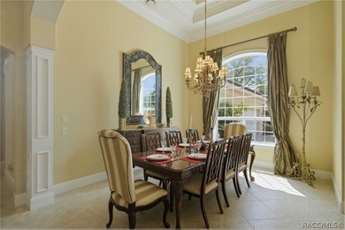 Nestled behind the gate of Black Diamond Ranch awaits a timeless on Black Diamond Ranch Golf Course in Florida - for sale on GolfHomes.com, golf home, golf lot