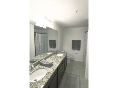 Experience resort-style living in this beautifully furnished on Lakewood National Golf Club in Florida - for sale on GolfHomes.com, golf home, golf lot