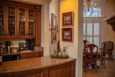 Welcome to 645 Whisper Woods Drive, a stunning estate located in on The Club at Eaglebrooke in Florida - for sale on GolfHomes.com, golf home, golf lot