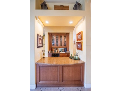 Welcome to 645 Whisper Woods Drive, a stunning estate located in on The Club at Eaglebrooke in Florida - for sale on GolfHomes.com, golf home, golf lot