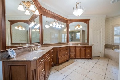 Welcome to 645 Whisper Woods Drive, a stunning estate located in on The Club at Eaglebrooke in Florida - for sale on GolfHomes.com, golf home, golf lot