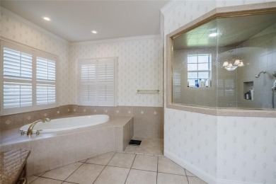 Welcome to 645 Whisper Woods Drive, a stunning estate located in on The Club at Eaglebrooke in Florida - for sale on GolfHomes.com, golf home, golf lot