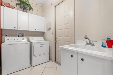 This exceptional estate home boasts a prime location on the golf on Plantation Bay Golf and Country Club in Florida - for sale on GolfHomes.com, golf home, golf lot