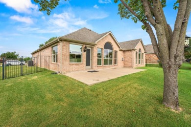 Welcome to this stunning 3-bedroom, 2-bathroom home backing up on Oakmont Country Club in Texas - for sale on GolfHomes.com, golf home, golf lot