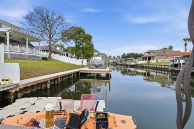 Deep water canal-front home in Gulf Breeze Featured on popular on Tiger Point Golf and Country Club in Florida - for sale on GolfHomes.com, golf home, golf lot