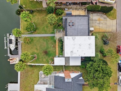 Deep water canal-front home in Gulf Breeze Featured on popular on Tiger Point Golf and Country Club in Florida - for sale on GolfHomes.com, golf home, golf lot