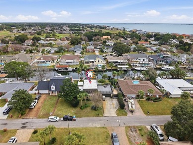 Deep water canal-front home in Gulf Breeze Featured on popular on Tiger Point Golf and Country Club in Florida - for sale on GolfHomes.com, golf home, golf lot