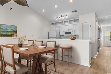 Great golf course and water views from this top floor condo in on Aberdeen Golf and Country Club in South Carolina - for sale on GolfHomes.com, golf home, golf lot