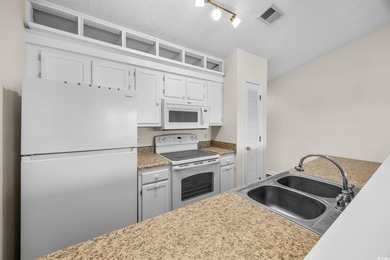 Great golf course and water views from this top floor condo in on Aberdeen Golf and Country Club in South Carolina - for sale on GolfHomes.com, golf home, golf lot