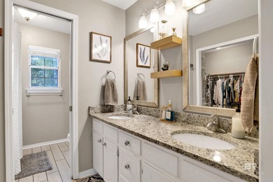 Welcome to this charming home tucked away at the end of a quiet on Lake Forest Yacht and Country Club in Alabama - for sale on GolfHomes.com, golf home, golf lot