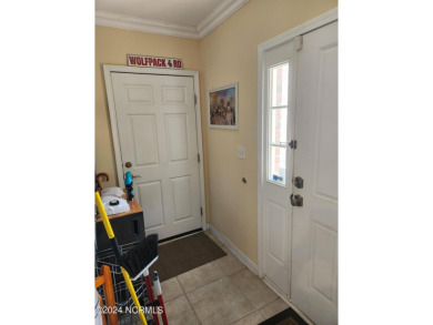 A beach getaway with three bedrooms PLUS an income producing on Sea Trail Golf Resort in North Carolina - for sale on GolfHomes.com, golf home, golf lot
