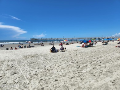 A beach getaway with three bedrooms PLUS an income producing on Sea Trail Golf Resort in North Carolina - for sale on GolfHomes.com, golf home, golf lot