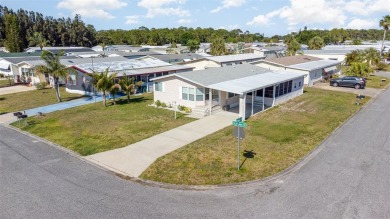 Under contract-accepting backup offers. Your Florida Lifestyle on Barefoot Bay Golf Course in Florida - for sale on GolfHomes.com, golf home, golf lot