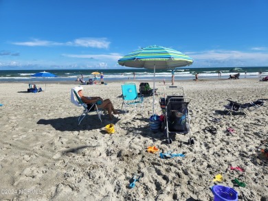 A beach getaway with three bedrooms PLUS an income producing on Sea Trail Golf Resort in North Carolina - for sale on GolfHomes.com, golf home, golf lot