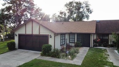 Discover this beautifully updated 2-bedroom, 2-bath patio home on Turtle Creek Golf Club in Florida - for sale on GolfHomes.com, golf home, golf lot