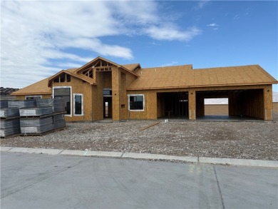 When completed this new custom home will be the *Flamingo* Model on Desert Lakes Golf Course in Arizona - for sale on GolfHomes.com, golf home, golf lot