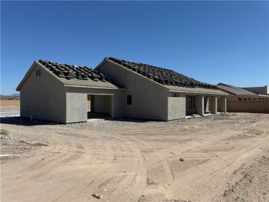 When completed this new custom home will be the *Flamingo* Model on Desert Lakes Golf Course in Arizona - for sale on GolfHomes.com, golf home, golf lot