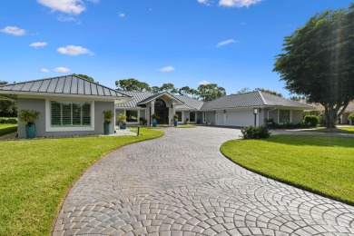 Experience luxury living at its finest in this fully reimagined on Floridian Golf and Yacht Club in Florida - for sale on GolfHomes.com, golf home, golf lot