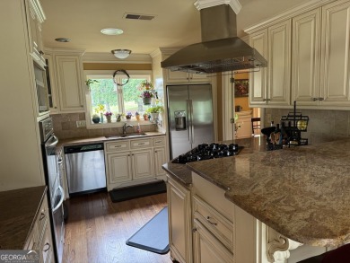 Imagine waking up every morning to a beautiful view overlooking on Brookfield Country Club in Georgia - for sale on GolfHomes.com, golf home, golf lot