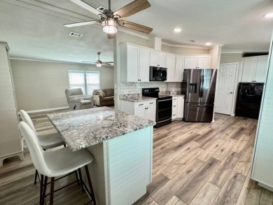 Beautifully Remodeled Home in a Resort-Style - ALL AGE on Silver Dollar Golf and Trap Club in Florida - for sale on GolfHomes.com, golf home, golf lot