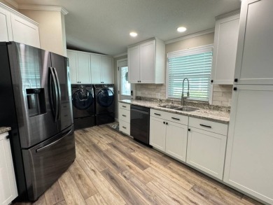 Beautifully Remodeled Home in a Resort-Style - ALL AGE on Silver Dollar Golf and Trap Club in Florida - for sale on GolfHomes.com, golf home, golf lot