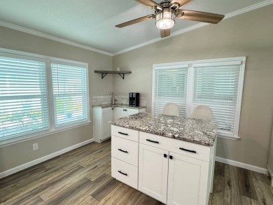 Beautifully Remodeled Home in a Resort-Style - ALL AGE on Silver Dollar Golf and Trap Club in Florida - for sale on GolfHomes.com, golf home, golf lot